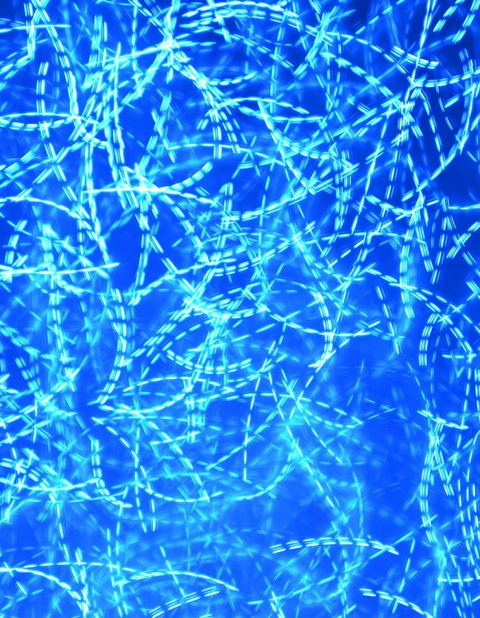 Abstract blue glowing lines representing physical strength and energy